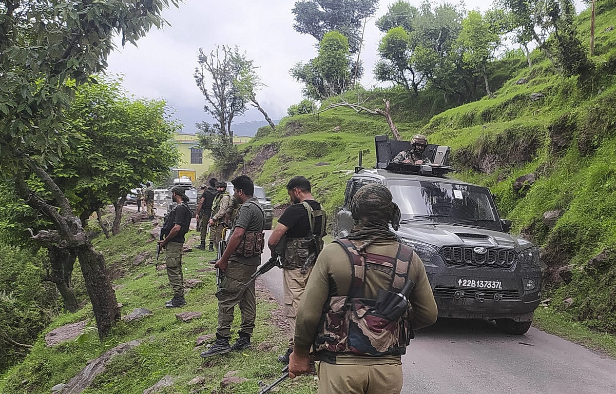 PTI : Security forces personnel during an encounter with terrorists in Gundha area of Rajouri district, Tuesday